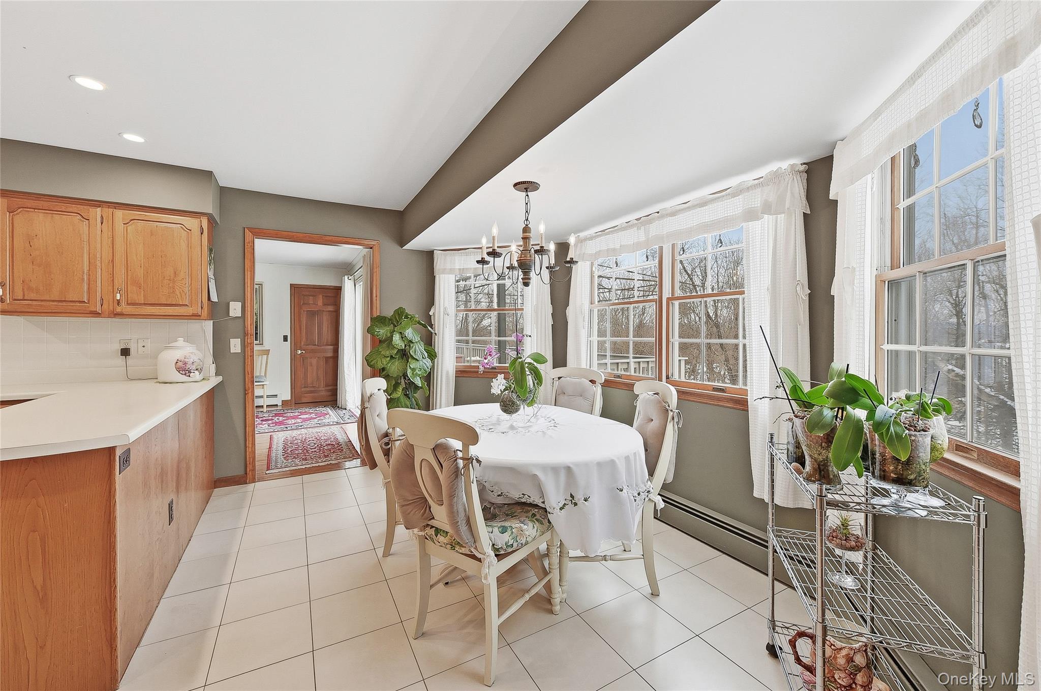 183 High Meadows Road Walden, NY 12586 - Photo 10 of 44 Breakfast nook featuring a chandelier, light tile patterned floors, and recessed lighting