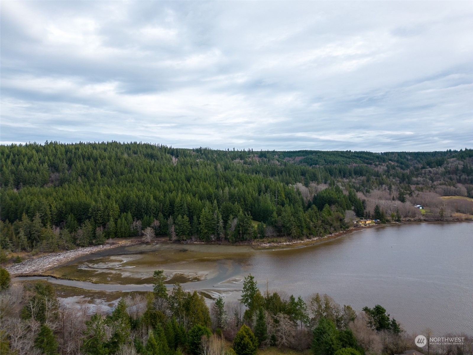 981 Carl Johnson Road Quilcene, WA 98376 - Photo 14 of 15 a view of a lake with green space