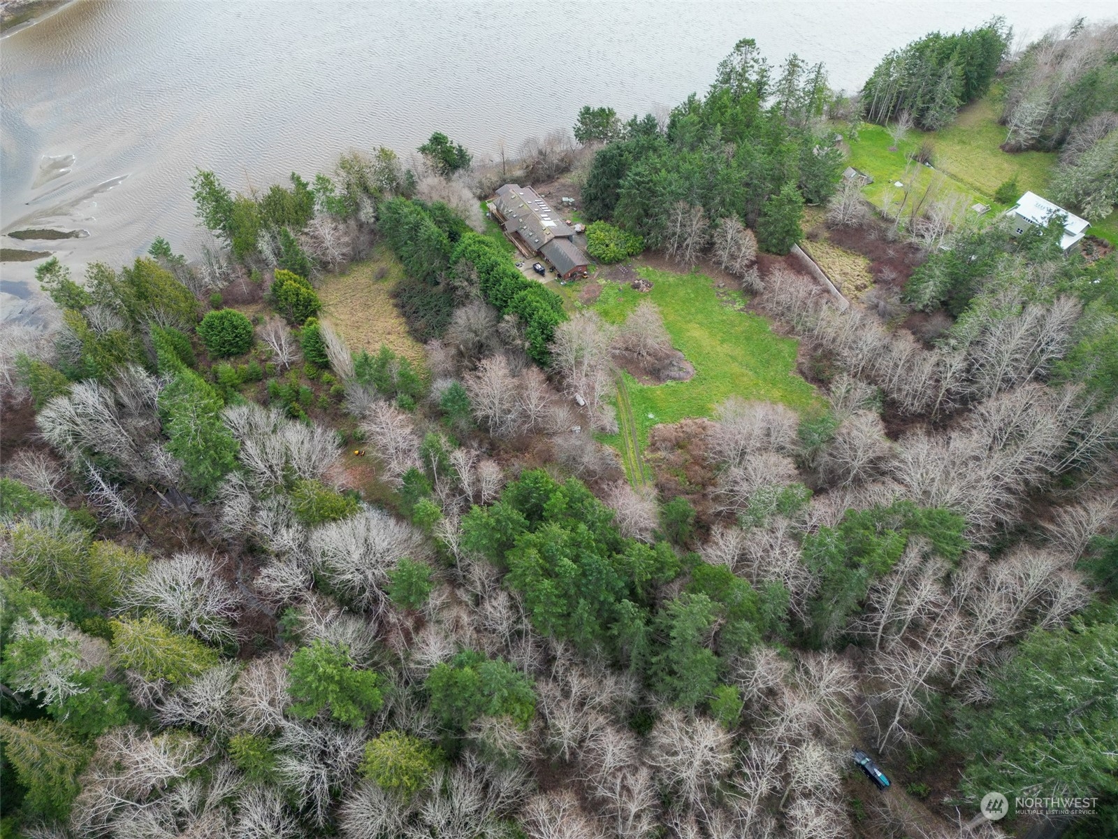 981 Carl Johnson Road Quilcene, WA 98376 - Photo 10 of 15 an aerial view of a house with a yard