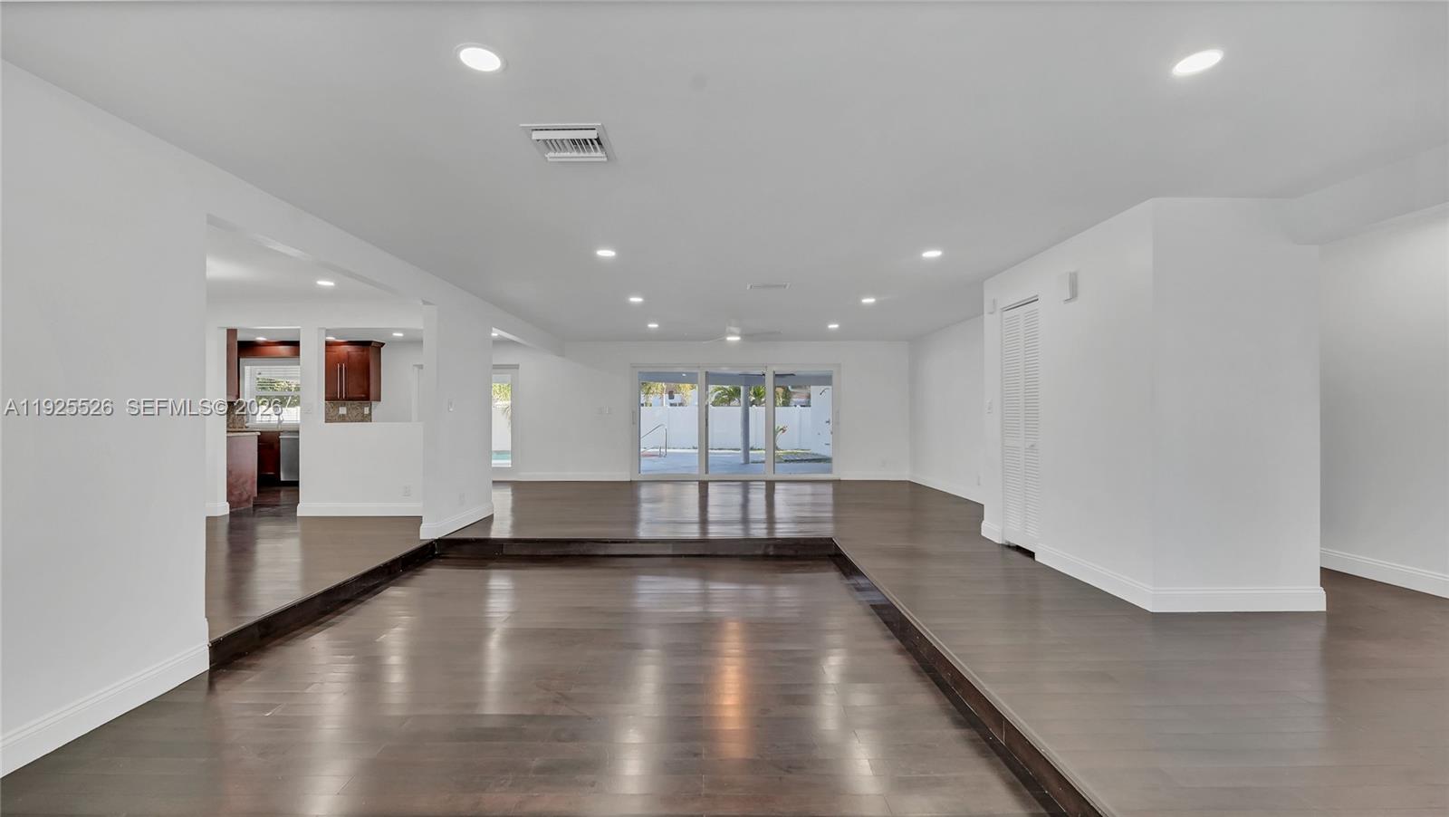 620 Northeast 2nd Street Pompano Beach, FL 33060 - Photo 11 of 53 a view of empty room with wooden floor