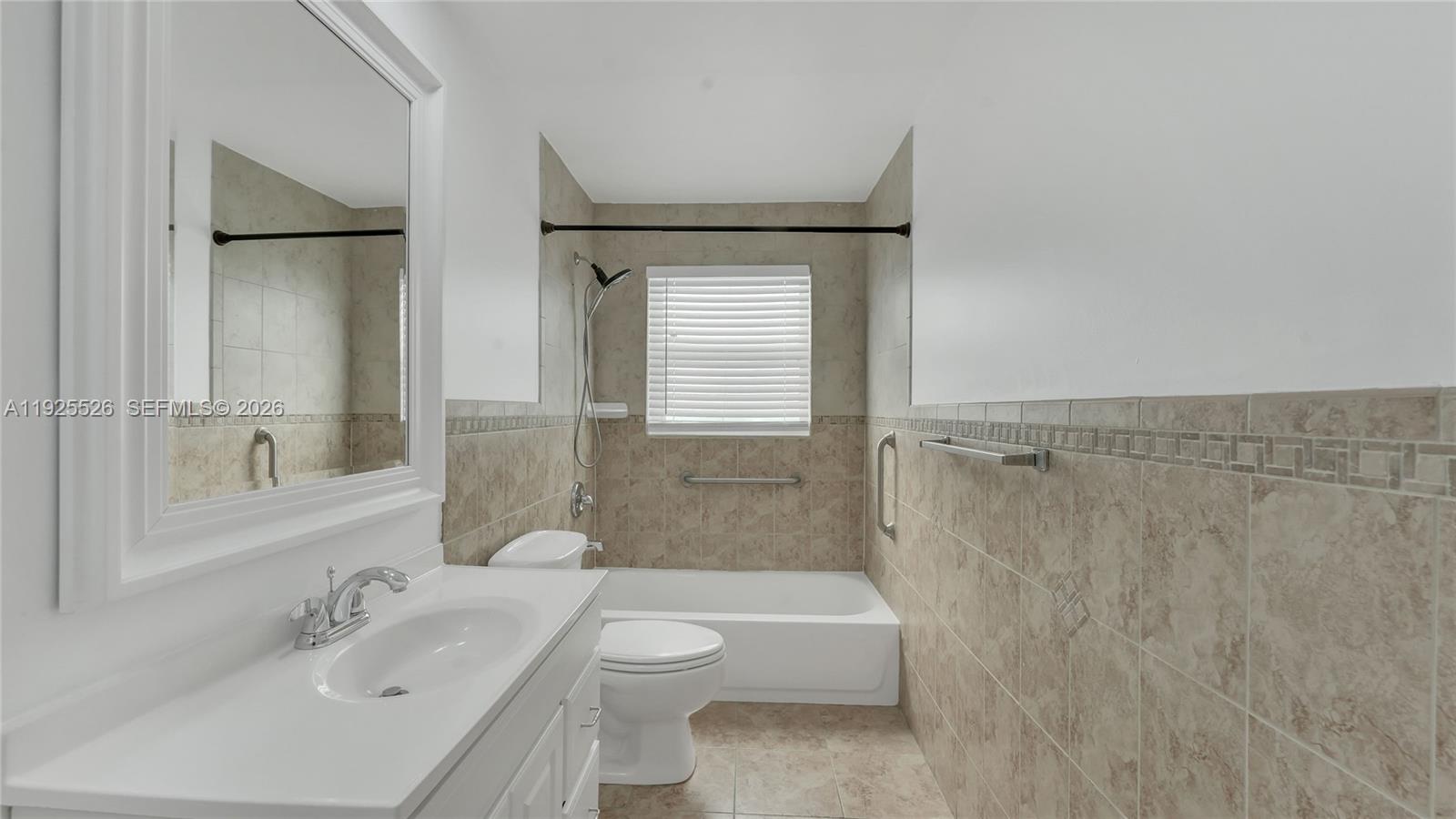 620 Northeast 2nd Street Pompano Beach, FL 33060 - Photo 27 of 53 a bathroom with a sink a toilet and shower