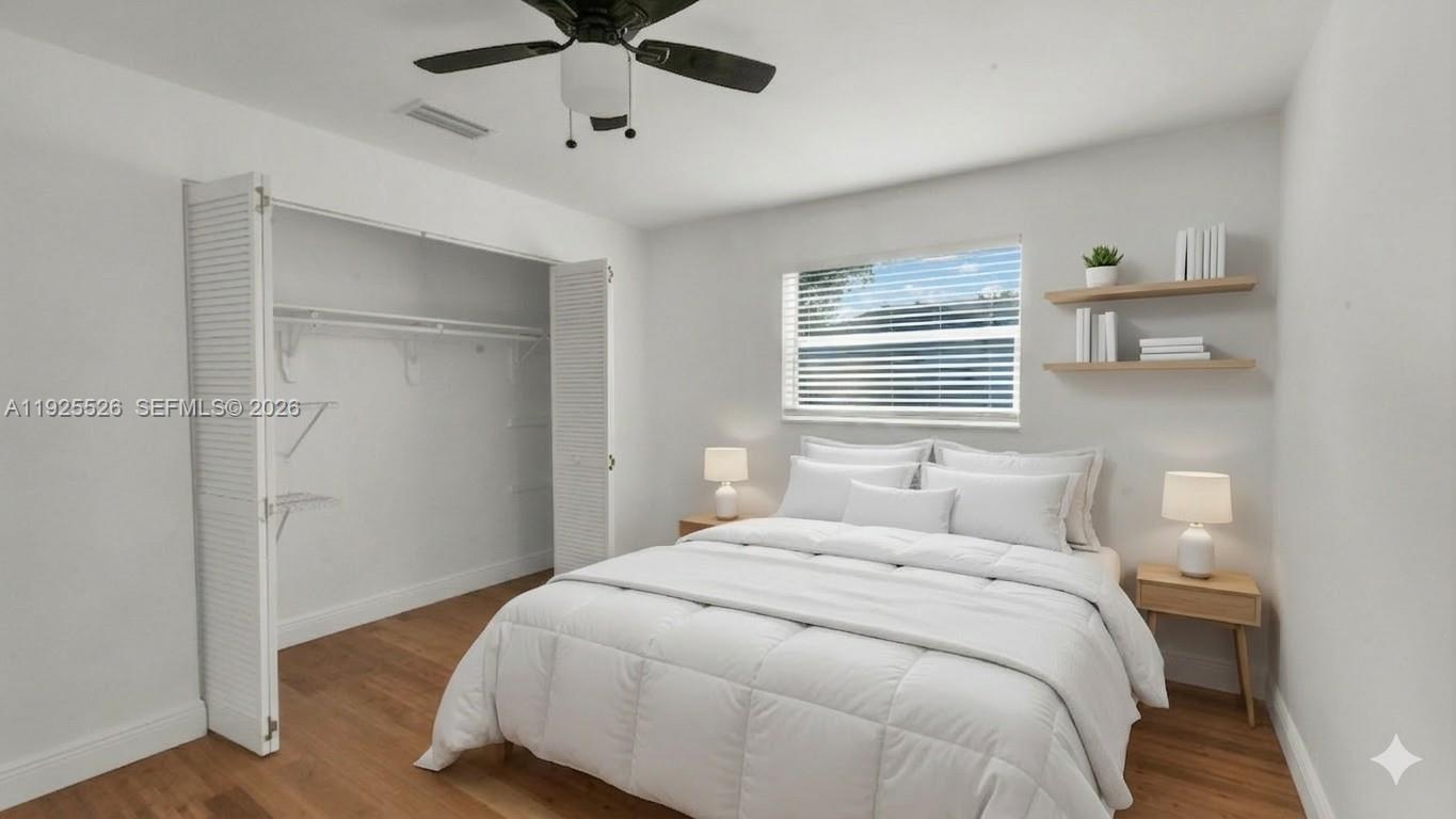 620 Northeast 2nd Street Pompano Beach, FL 33060 - Photo 36 of 53 a bedroom with a bed and a window