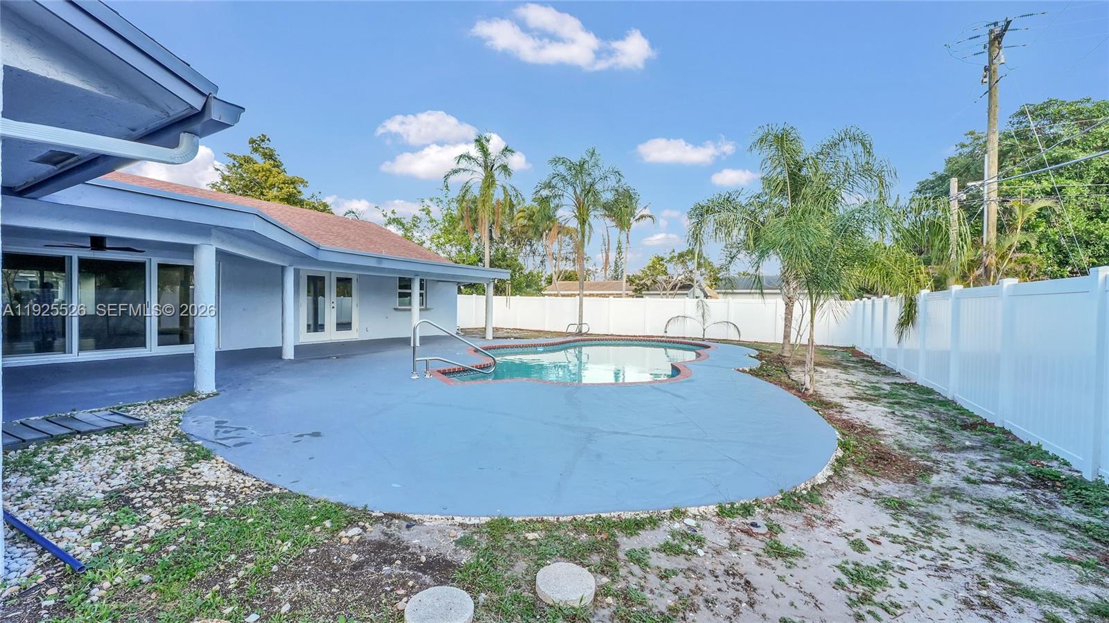 620 Northeast 2nd Street Pompano Beach, FL 33060 - Photo 41 of 53 a view of a house with backyard and sitting area