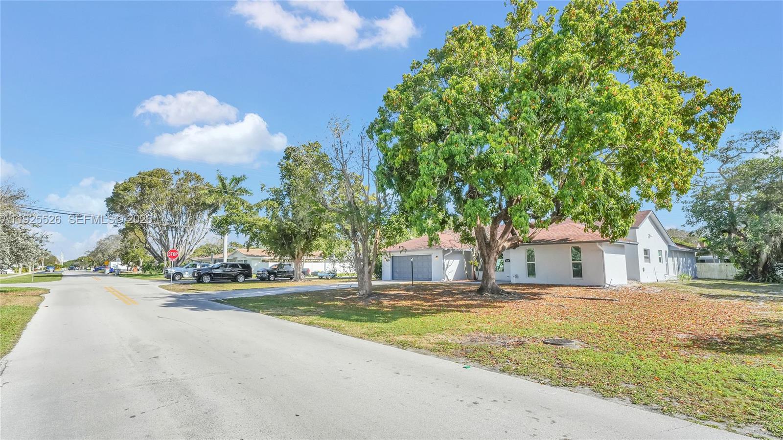 620 Northeast 2nd Street Pompano Beach, FL 33060 - Photo 53 of 53 a house with palm tree in front of it