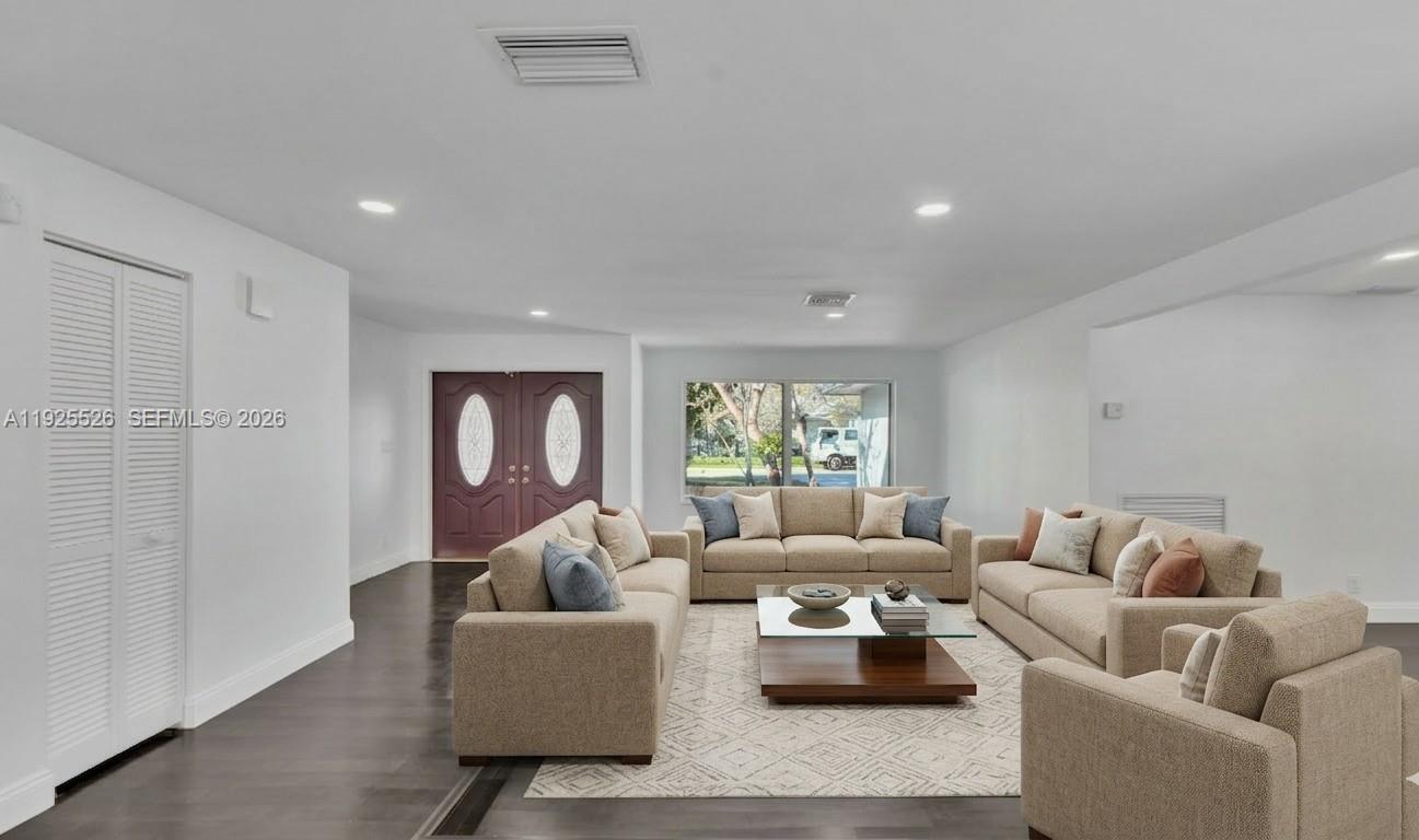 620 Northeast 2nd Street Pompano Beach, FL 33060 - Photo 10 of 53 a living room with furniture and a large window