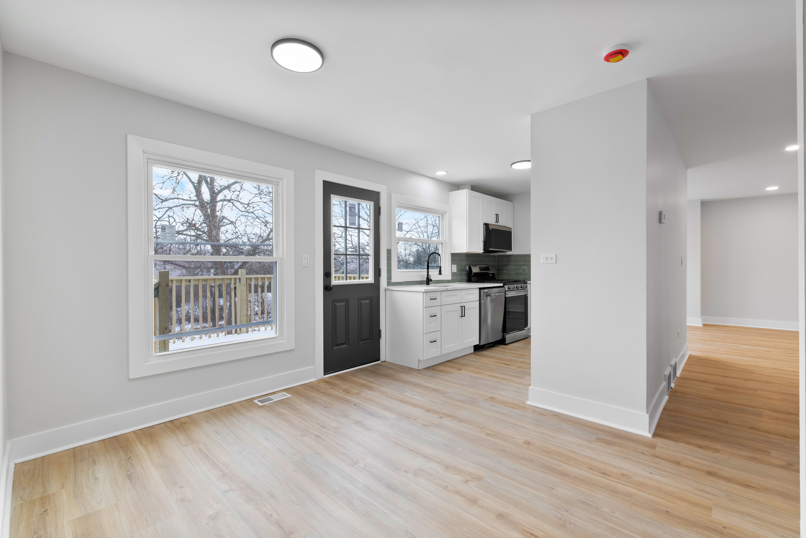 523 Nathan Road University Park, IL 60484 - Photo 18 of 43 a view of kitchen with wooden floor and window