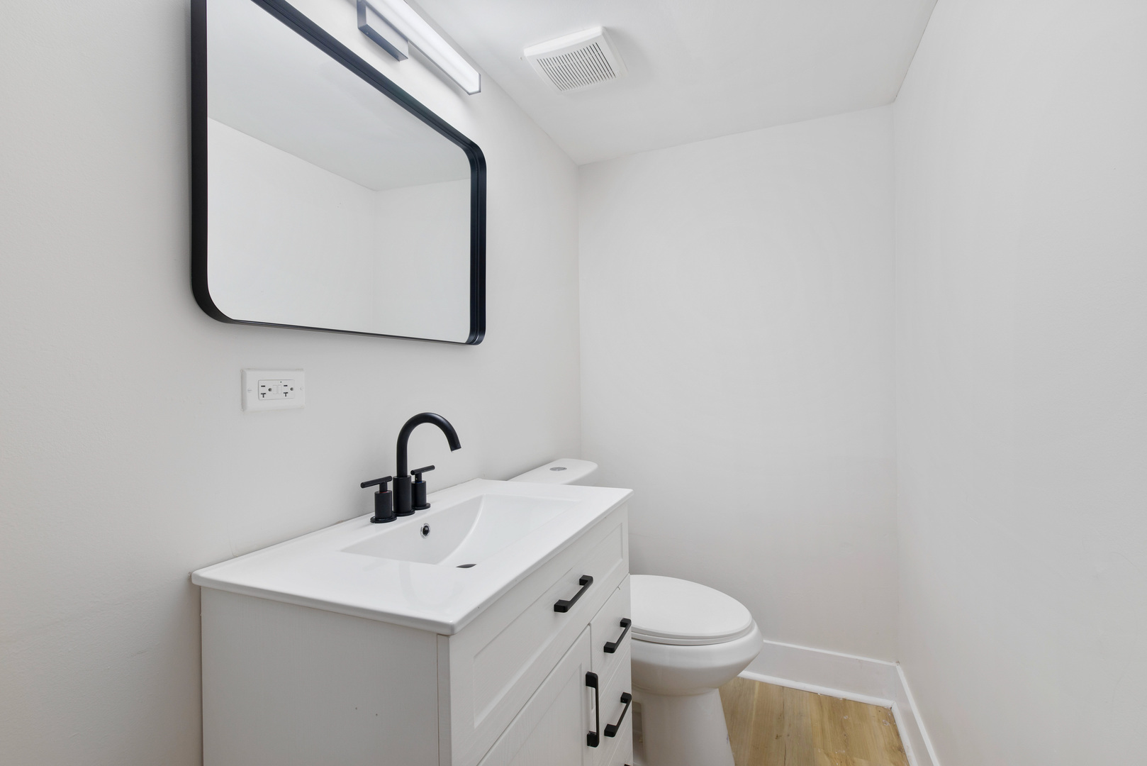 523 Nathan Road University Park, IL 60484 - Photo 32 of 43 a bathroom with a toilet sink and mirror