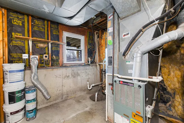 a view of street with wooden fence