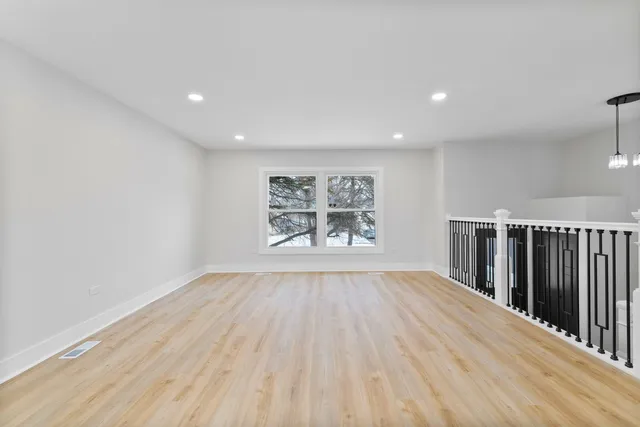 a view of livingroom with hardwood floor and window
