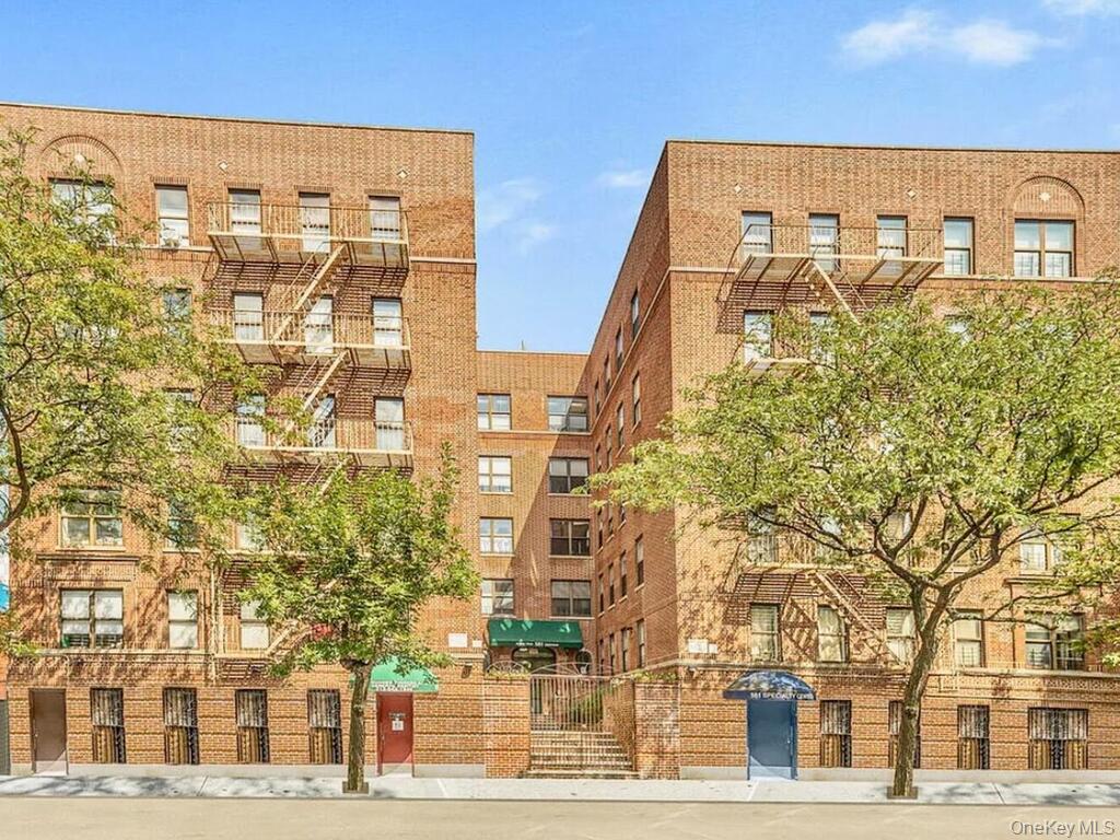 581 Academy Street, Unit GLE Manhattan, NY 10034 - Photo 17 of 18 front view of a building