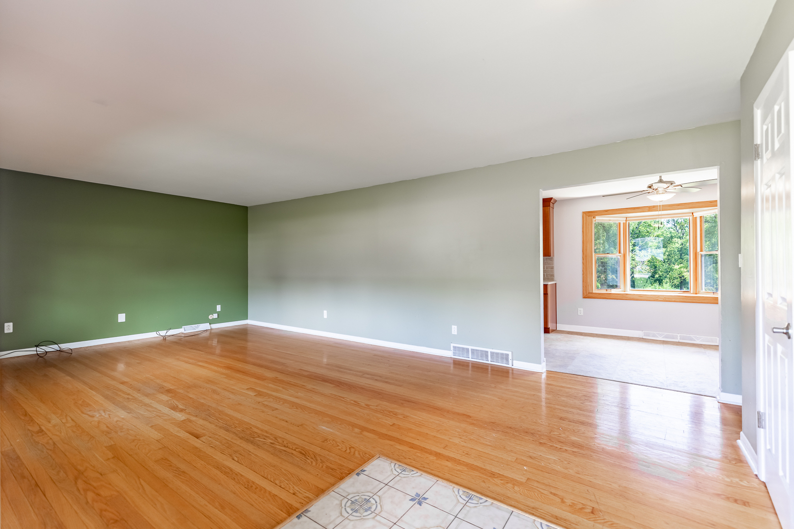 11609 North Brightway Road Mokena, IL 60448 - Photo 26 of 47 an empty room with wooden floor and windows