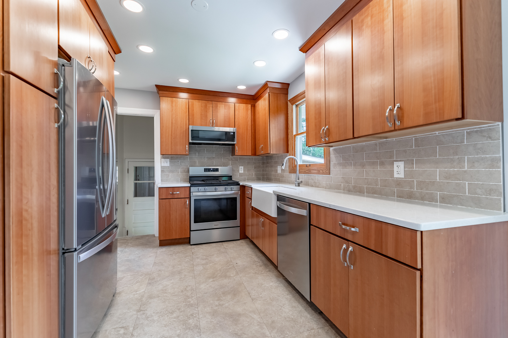 11609 North Brightway Road Mokena, IL 60448 - Photo 30 of 47 a kitchen with stainless steel appliances granite countertop a refrigerator a sink dishwasher a stove and a refrigerator