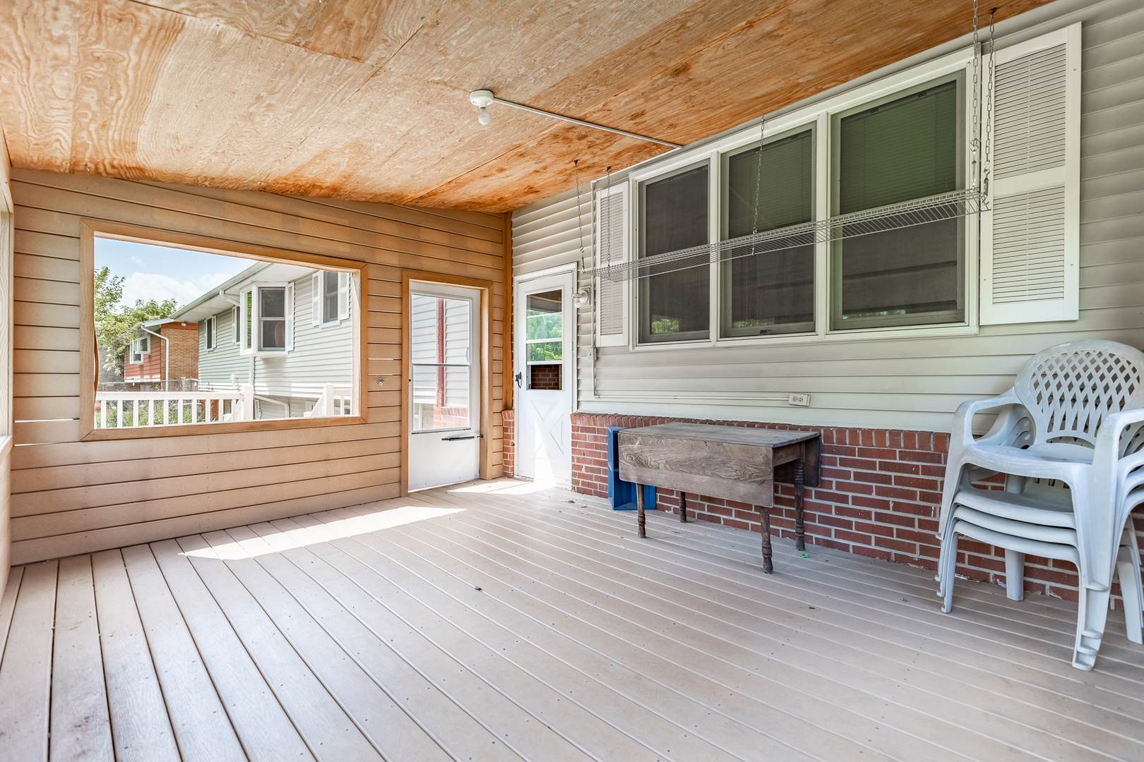 11609 North Brightway Road Mokena, IL 60448 - Photo 43 of 47 a view of a deck with table and chairs with wooden floor and fence