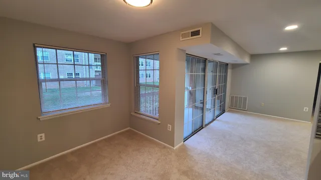 an empty room with windows