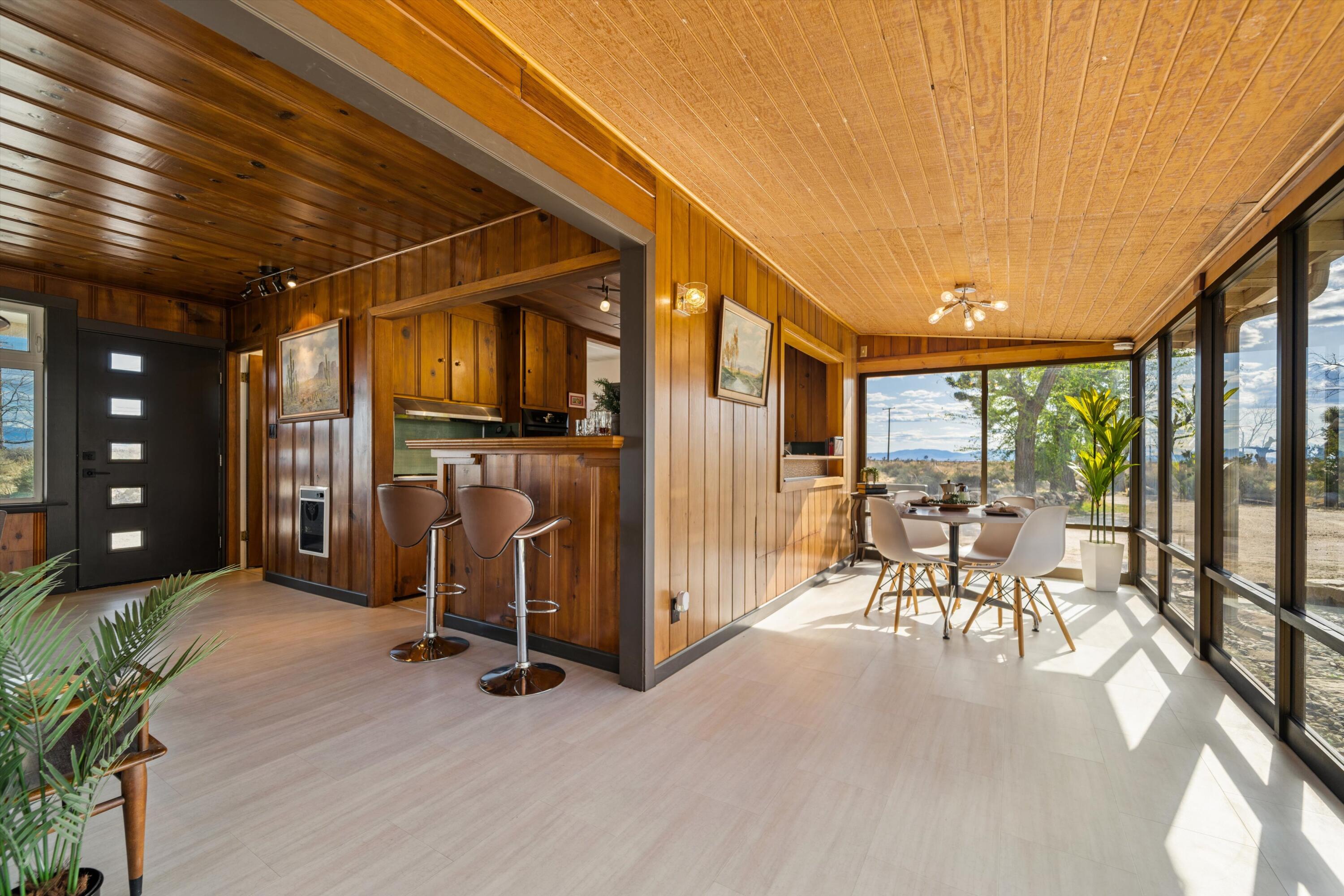 11337 Avenue E E Lancaster Ca East Lancaster, CA 93535 - Photo 15 of 60 a view of a livingroom with furniture and a garage