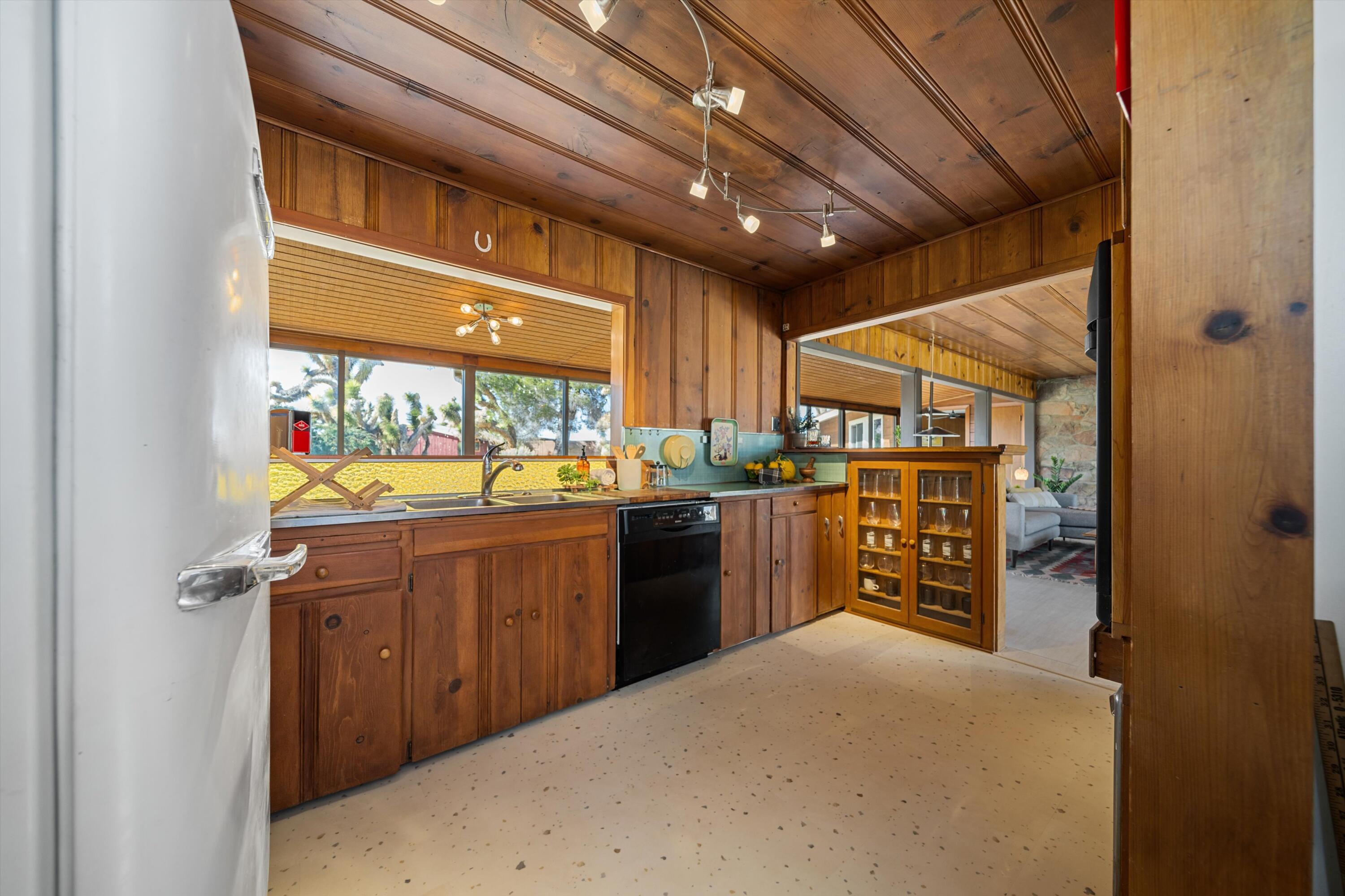 11337 Avenue E E Lancaster Ca East Lancaster, CA 93535 - Photo 24 of 60 a kitchen with stainless steel appliances granite countertop a refrigerator and a sink