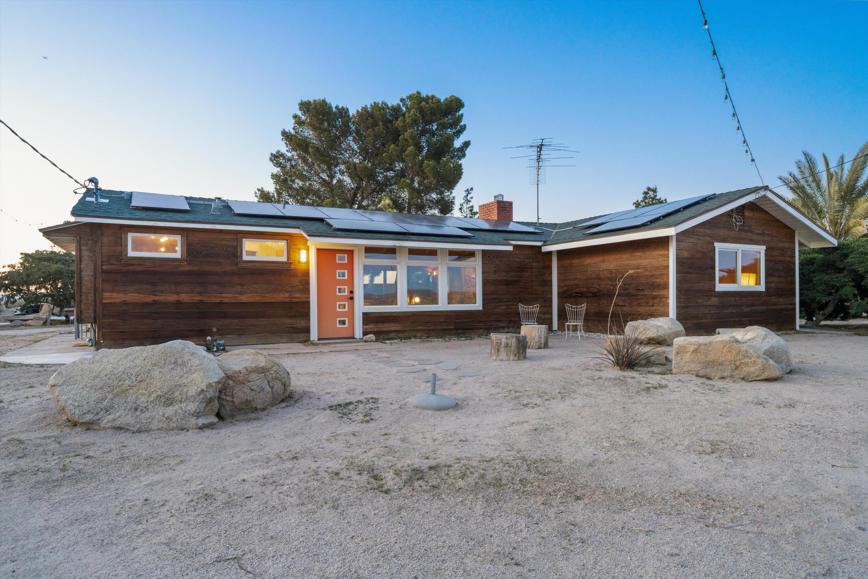 11337 Avenue E E Lancaster Ca East Lancaster, CA 93535 - Photo 56 of 60 a front view of a house with garden