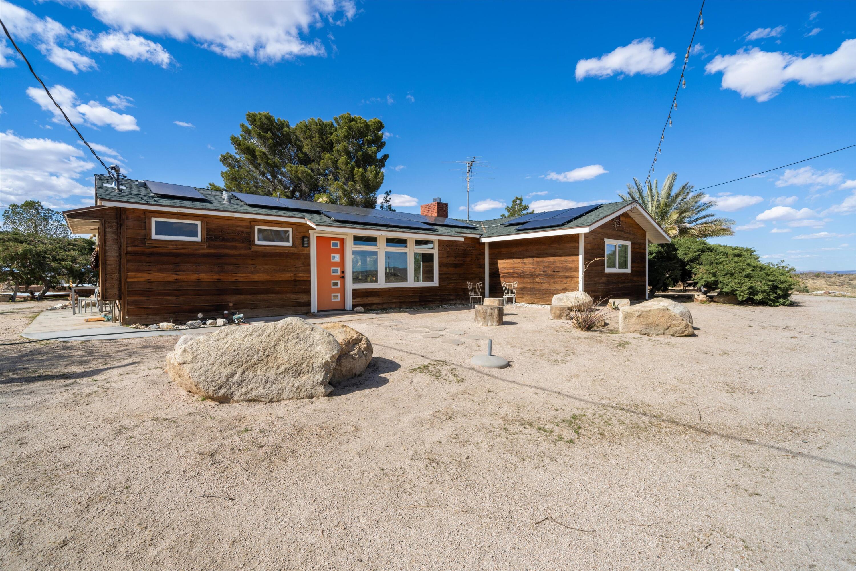 11337 Avenue E E Lancaster Ca East Lancaster, CA 93535 - Photo 9 of 60 a view of a house with a yard