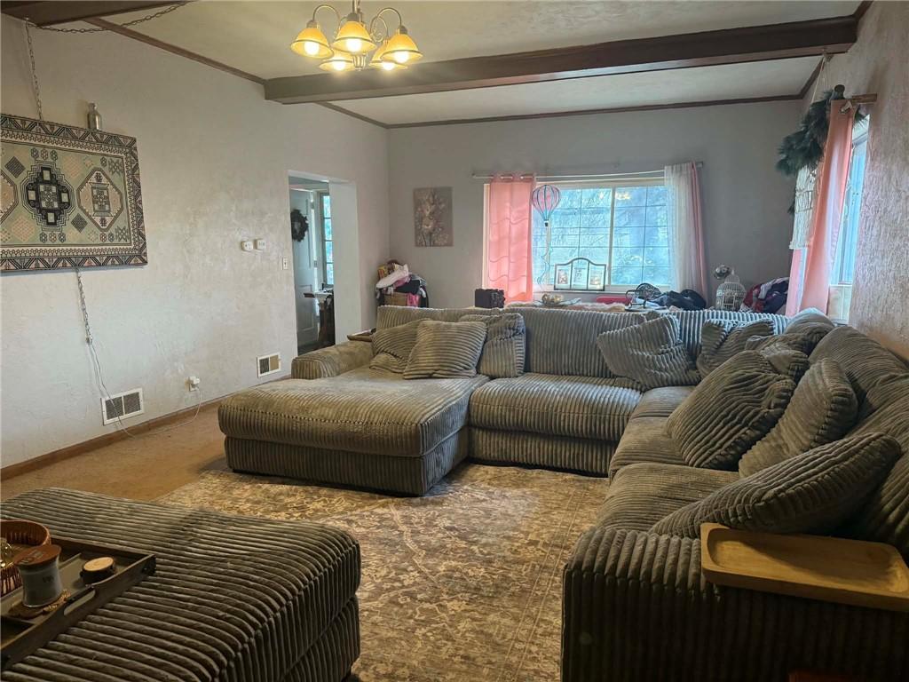 27 Legion Street Republic, PA 15475 - Photo 4 of 31 a bedroom with a bed and a couch