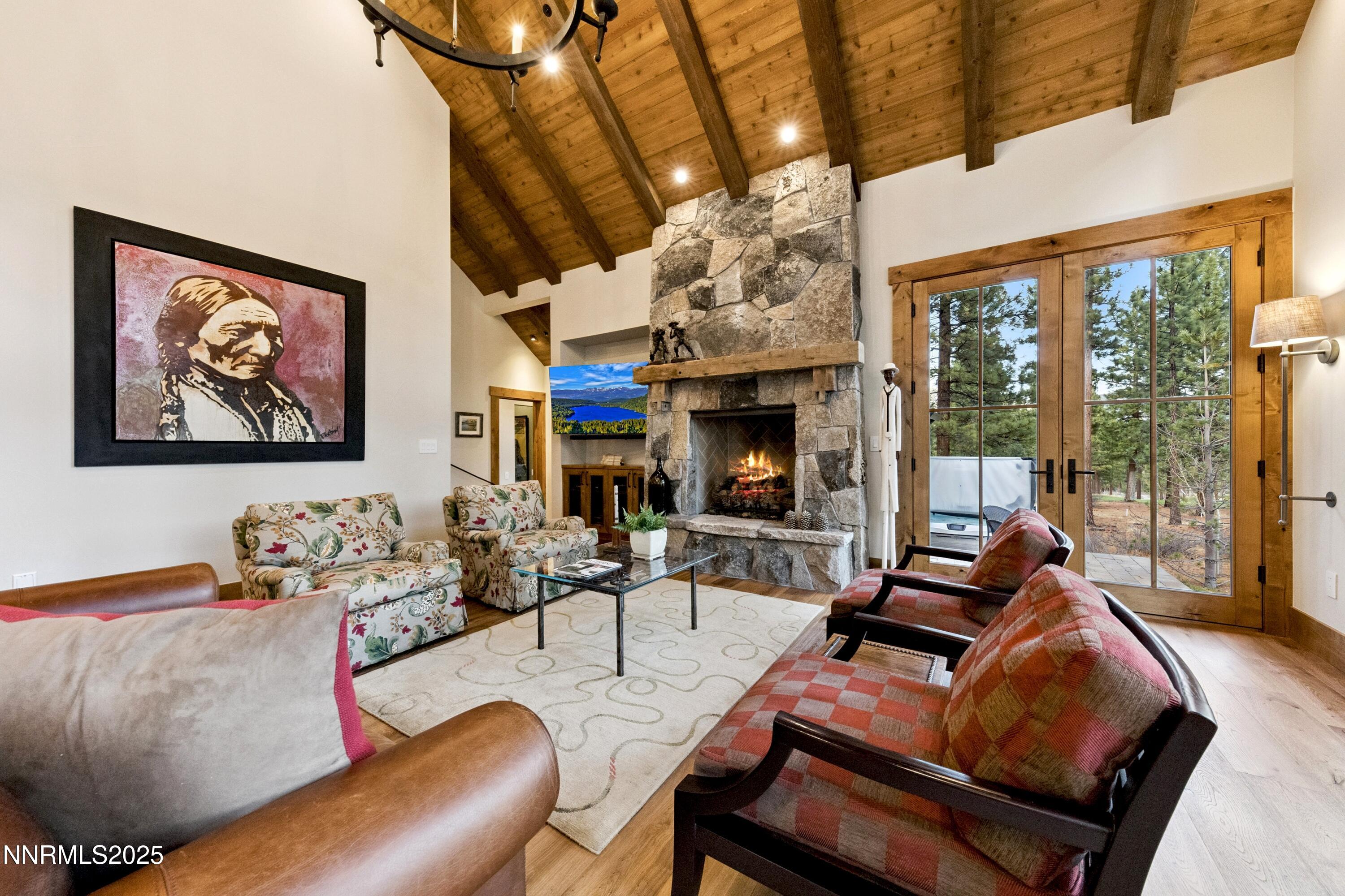 261 Redding Way Carson City, NV 89705 - Photo 11 of 83 a living room with furniture fireplace and floor to ceiling window