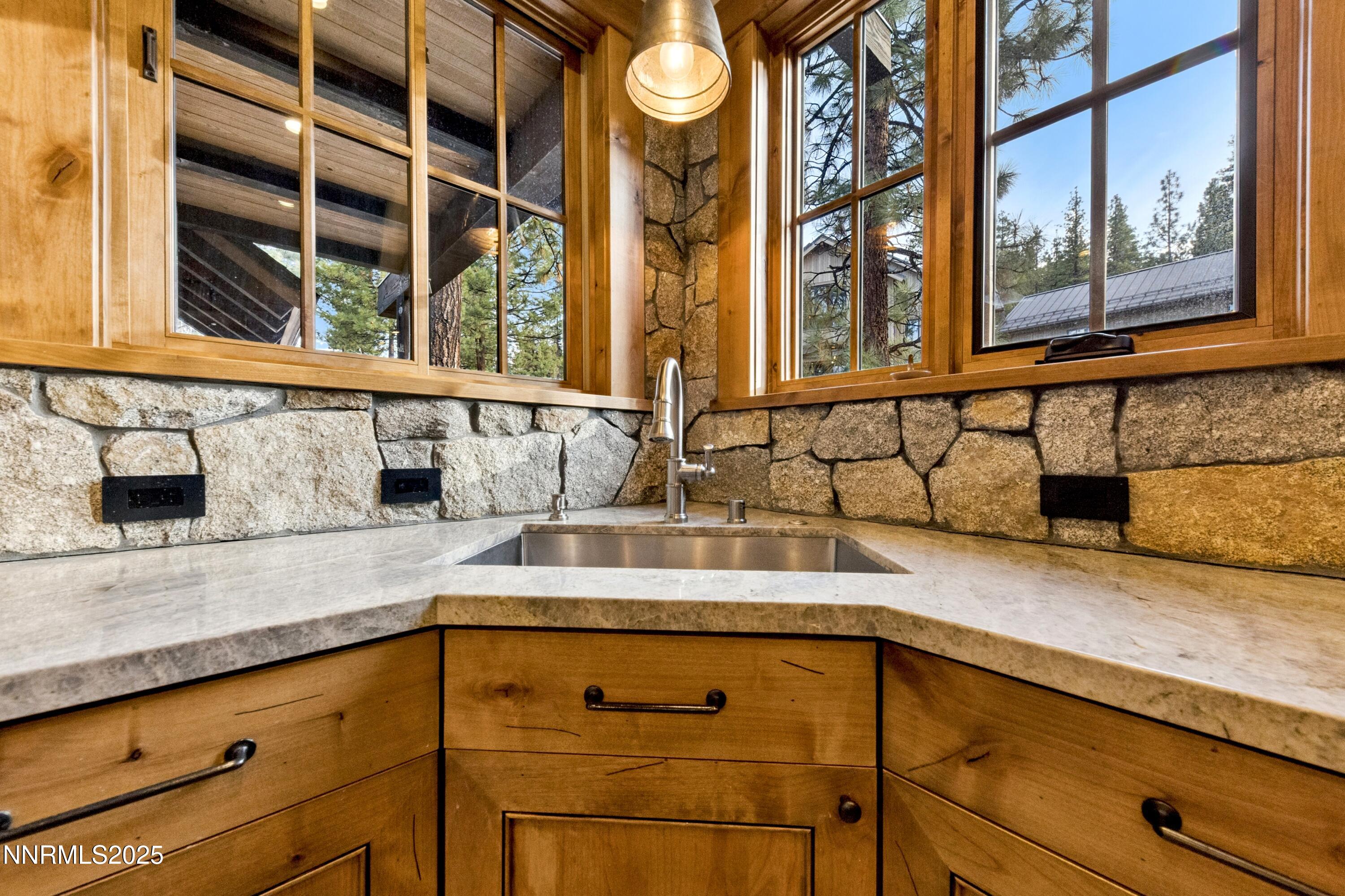 261 Redding Way Carson City, NV 89705 - Photo 22 of 83 a kitchen with a sink and a window