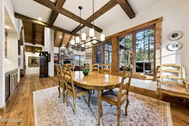 a bedroom with a large bed and a dresser