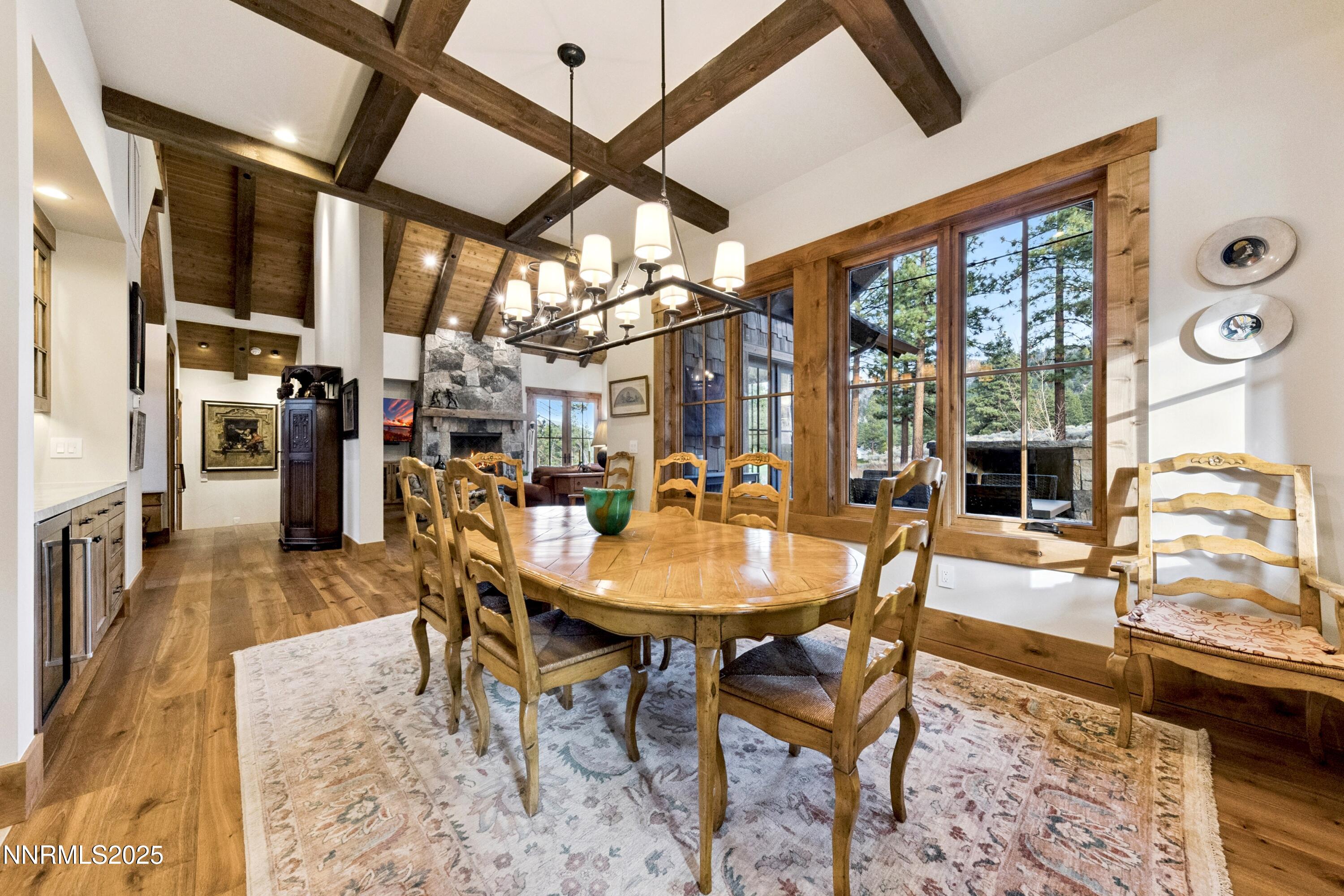 261 Redding Way Carson City, NV 89705 - Photo 23 of 83 a dining room with furniture and a floor to ceiling window