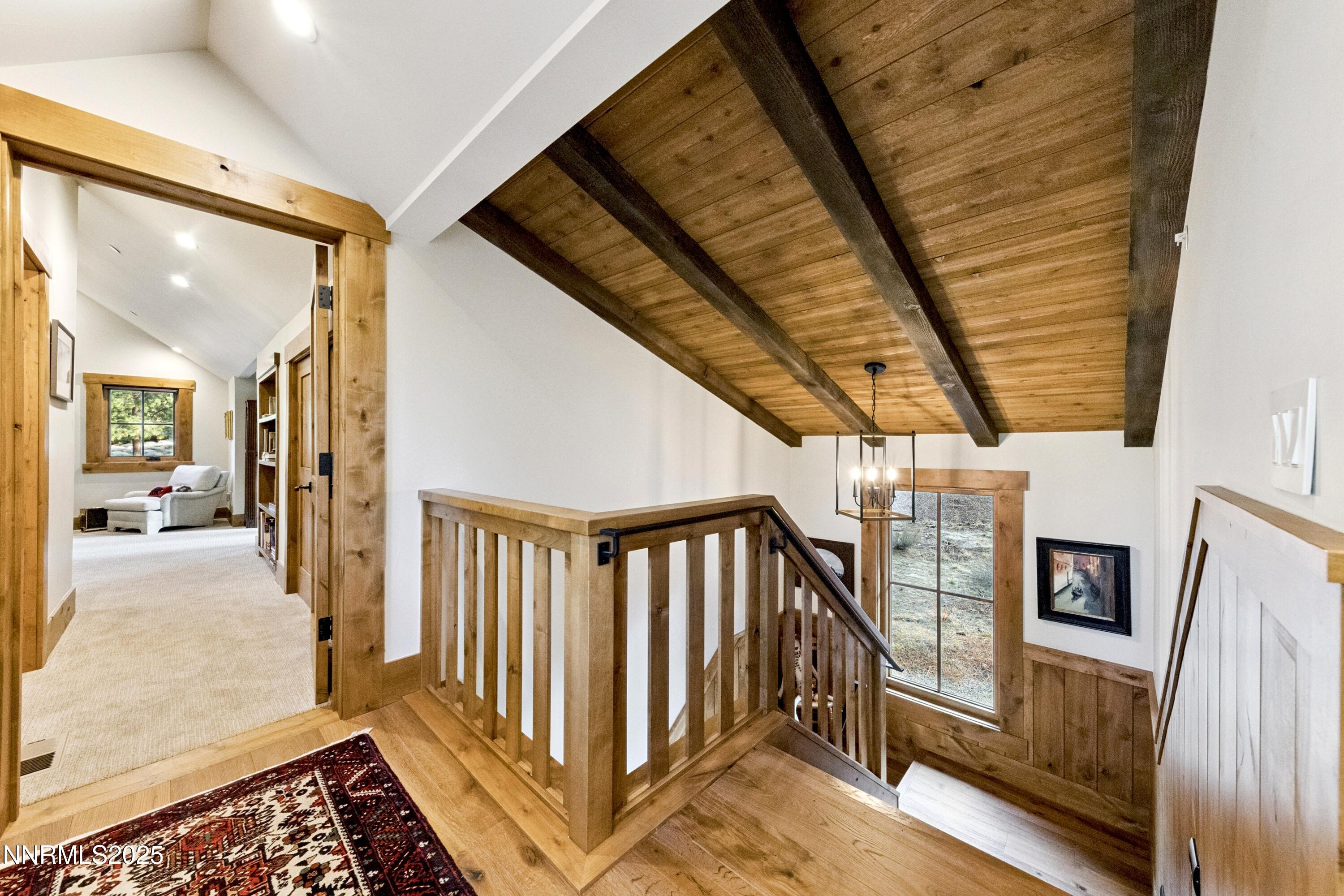 261 Redding Way Carson City, NV 89705 - Photo 35 of 83 a view of a hallway with wooden floors and furniture