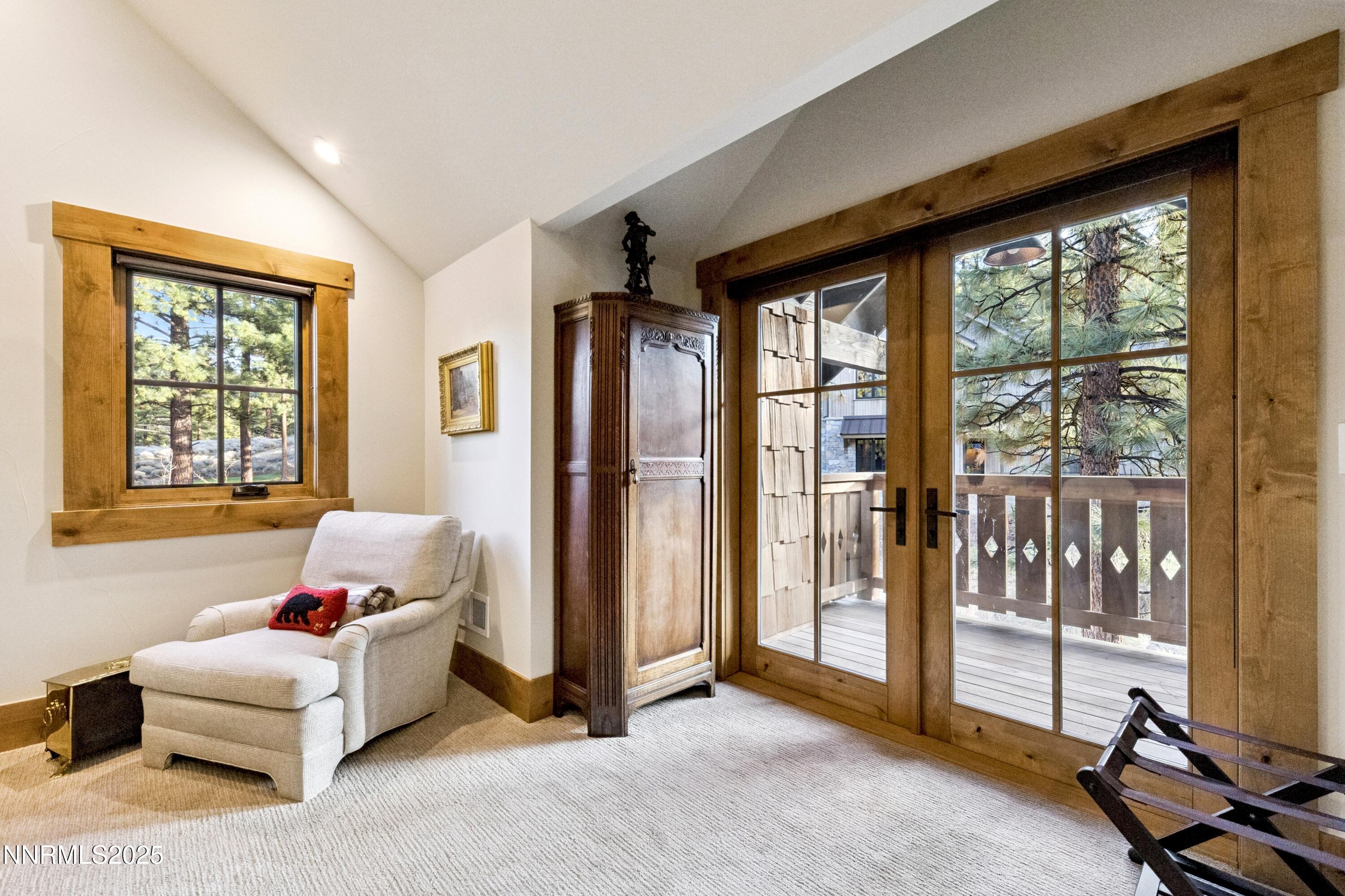 261 Redding Way Carson City, NV 89705 - Photo 38 of 83 a living room with furniture and a floor to ceiling window