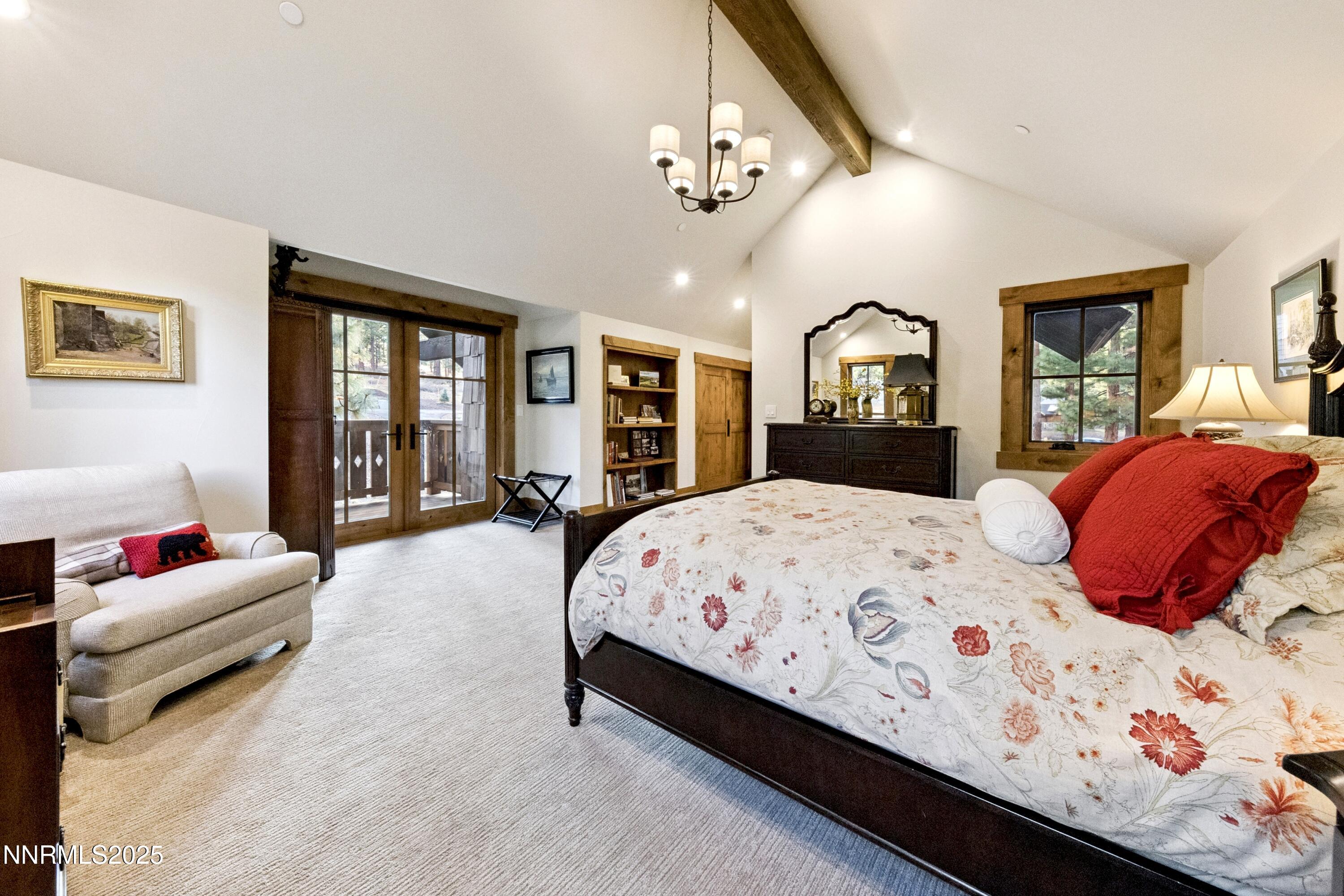 261 Redding Way Carson City, NV 89705 - Photo 39 of 83 a bedroom with a large bed and a dresser