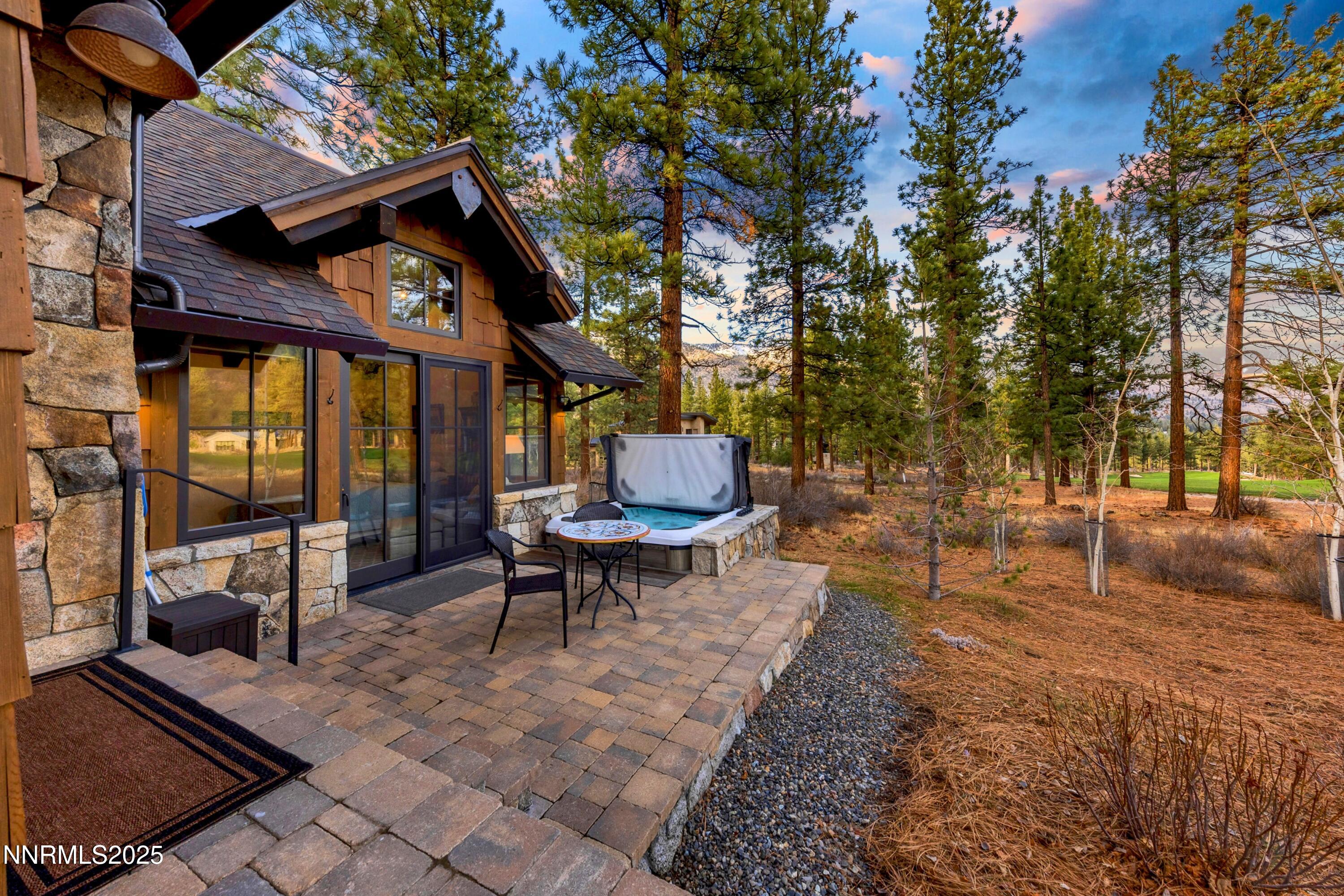 261 Redding Way Carson City, NV 89705 - Photo 55 of 83 a backyard of a house with a table and chairs