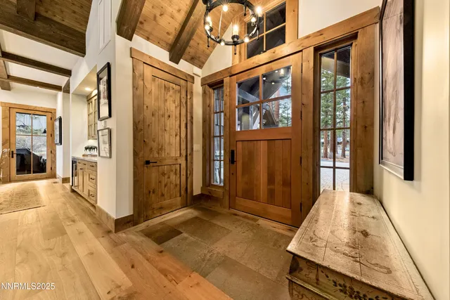 a living room with furniture ceiling fan and a fireplace