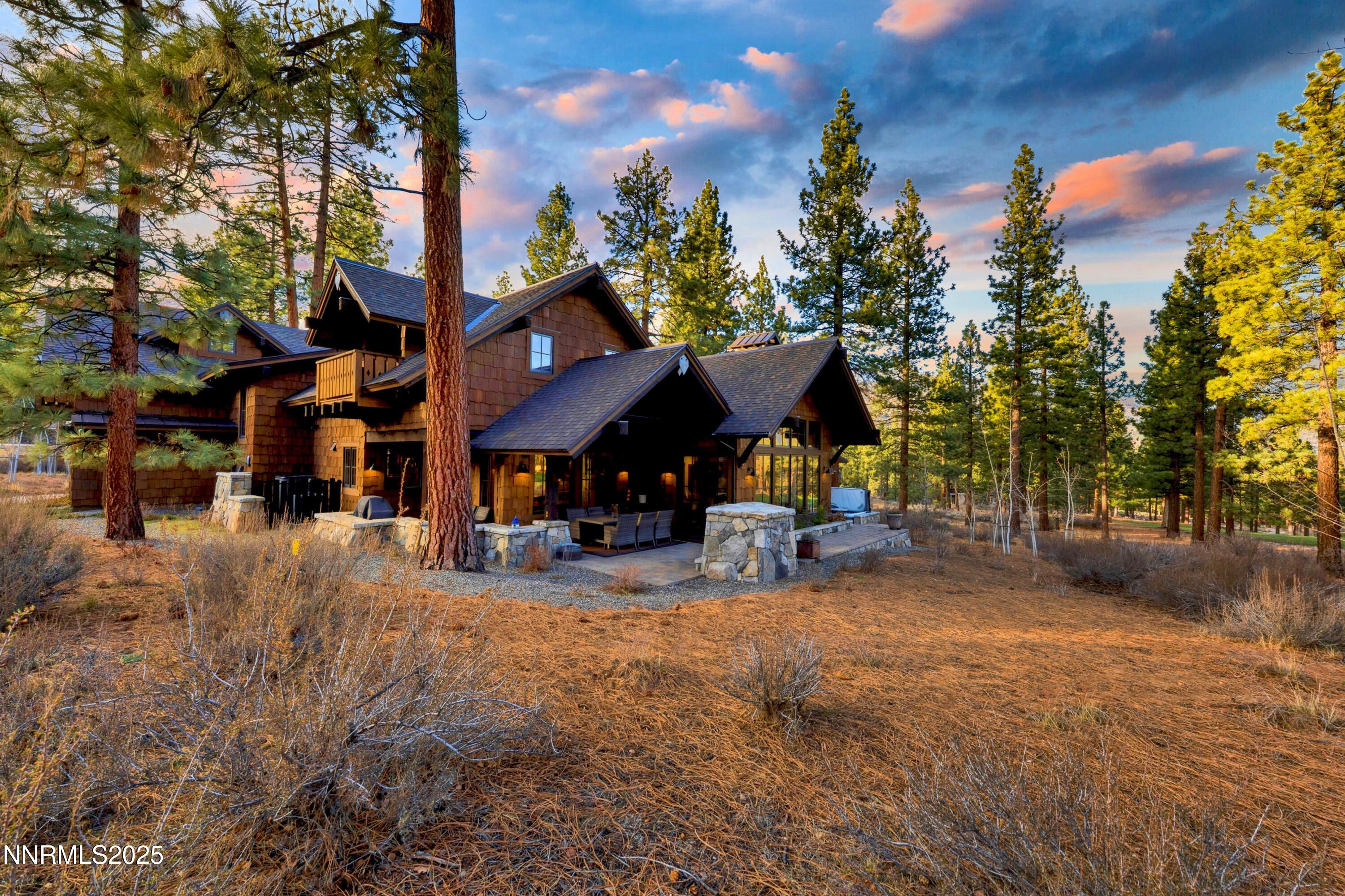 261 Redding Way Carson City, NV 89705 - Photo 75 of 83 a view of a house with a yard and sitting area