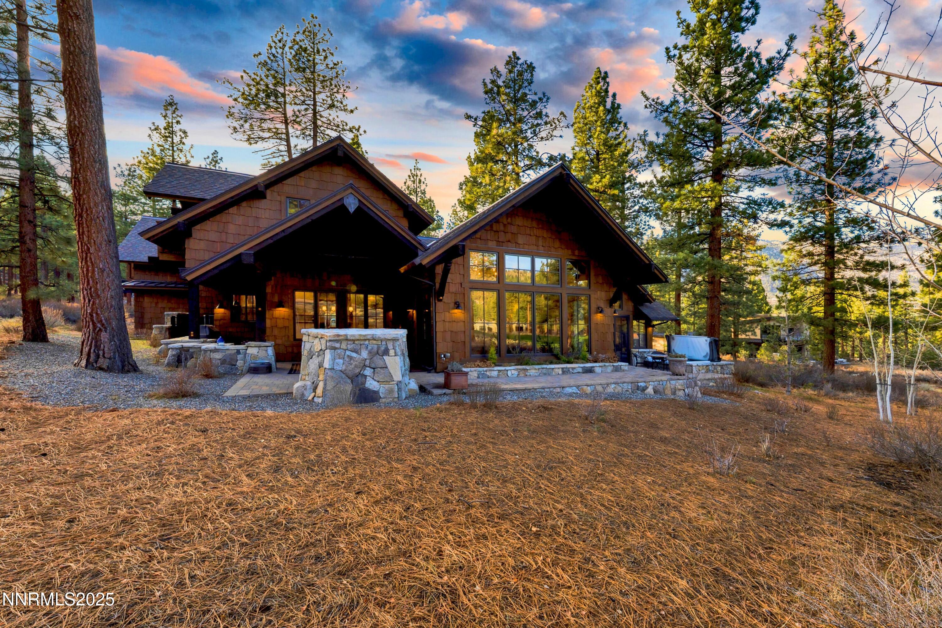 261 Redding Way Carson City, NV 89705 - Photo 77 of 83 a view of a house with a large tree and a yard