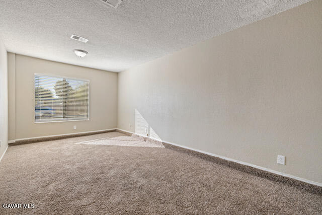523 East Kettering Street Lancaster, CA 93535 - Photo 15 of 28 an empty room with windows
