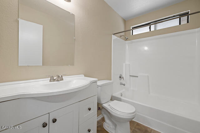 523 East Kettering Street Lancaster, CA 93535 - Photo 21 of 28 a bathroom with a sink a toilet and shower