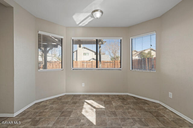 523 East Kettering Street Lancaster, CA 93535 - Photo 8 of 28 a view of an empty room with a window