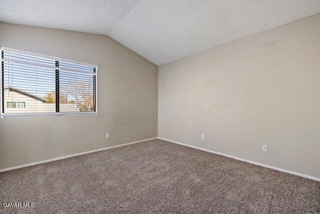 523 East Kettering Street Lancaster, CA 93535 - Photo 9 of 28 an empty room with a window