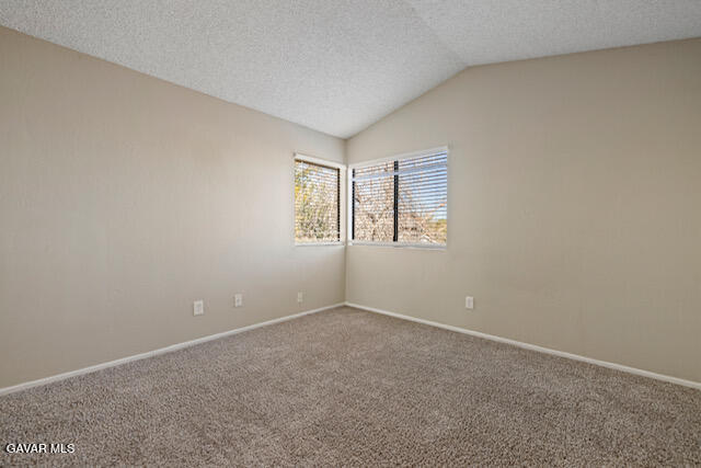 523 East Kettering Street Lancaster, CA 93535 - Photo 10 of 28 an empty room with windows