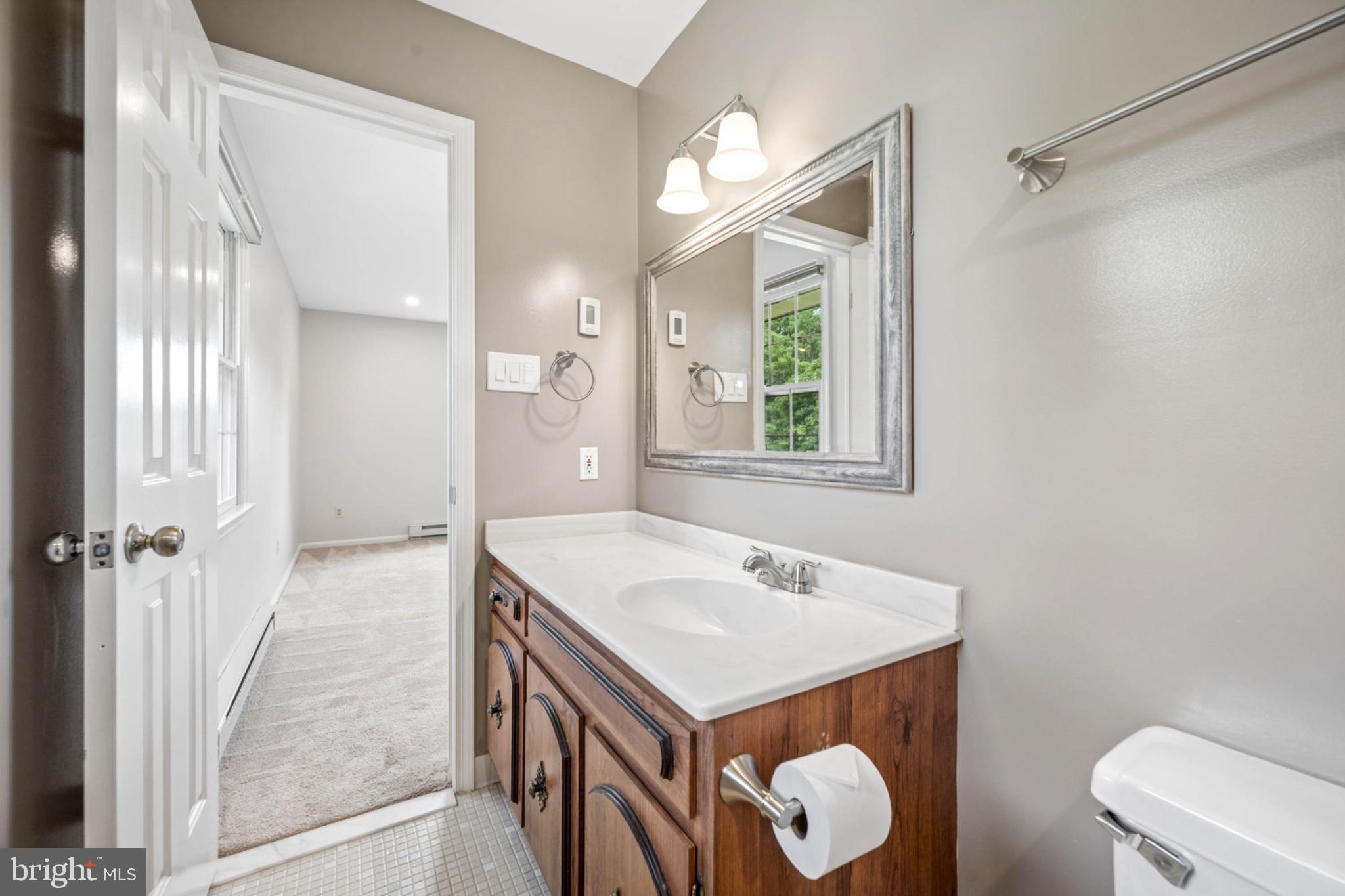 24513 Hanson Road Laytonsville, MD 20882 - Photo 18 of 58 Modern bathroom with elegant finishes.