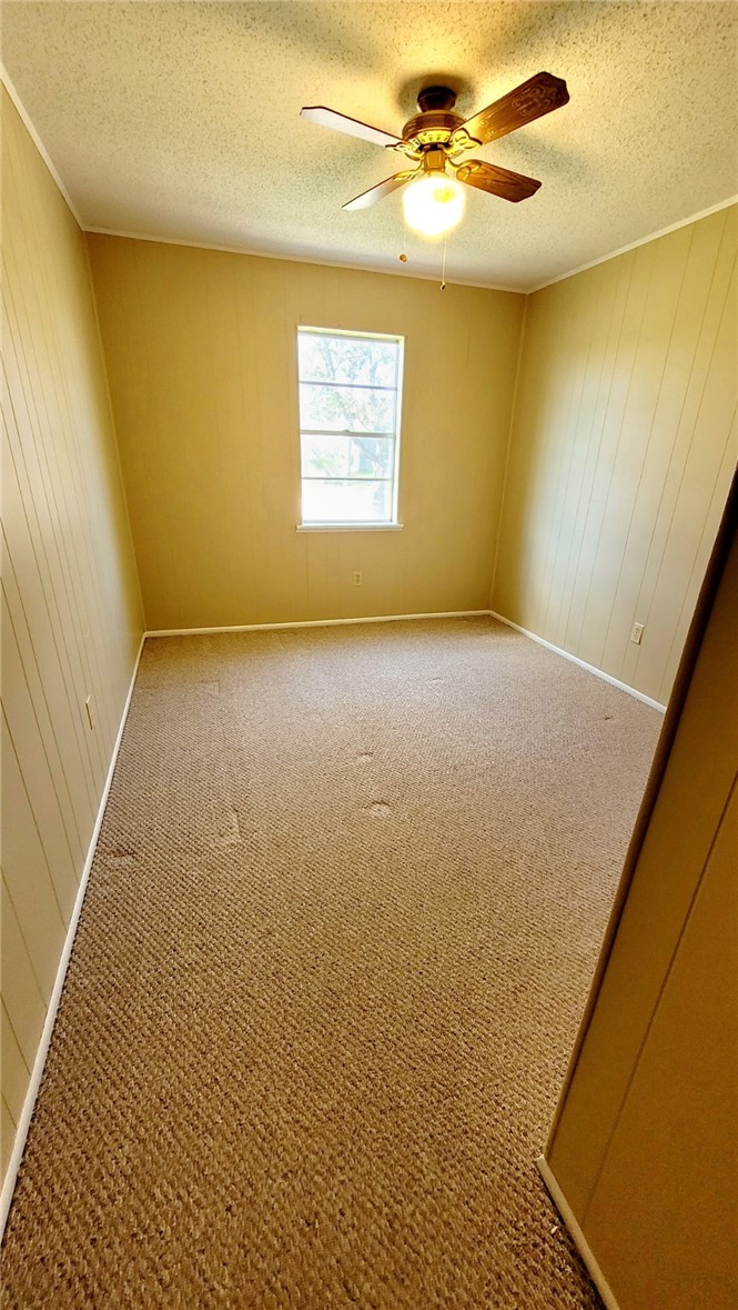 803 Ave H Sinton, TX 78387 - Photo 12 of 14 a view of an empty room and window