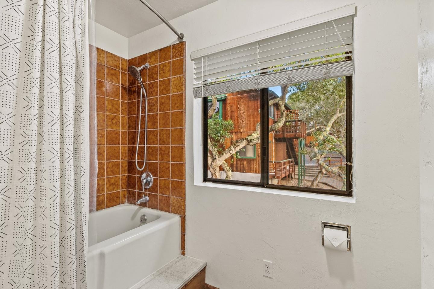 15460 Weather Rock Way Salinas, CA 93908 - Photo 14 of 32 a bathroom with a bathtub and a shower