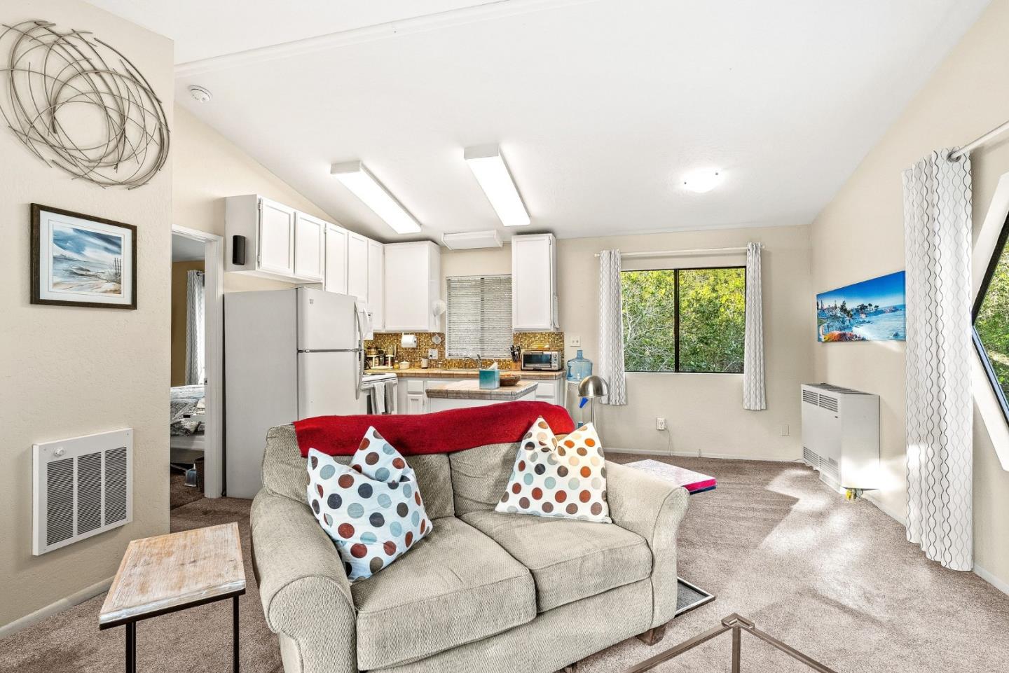 15460 Weather Rock Way Salinas, CA 93908 - Photo 17 of 32 a living room with furniture and a large window