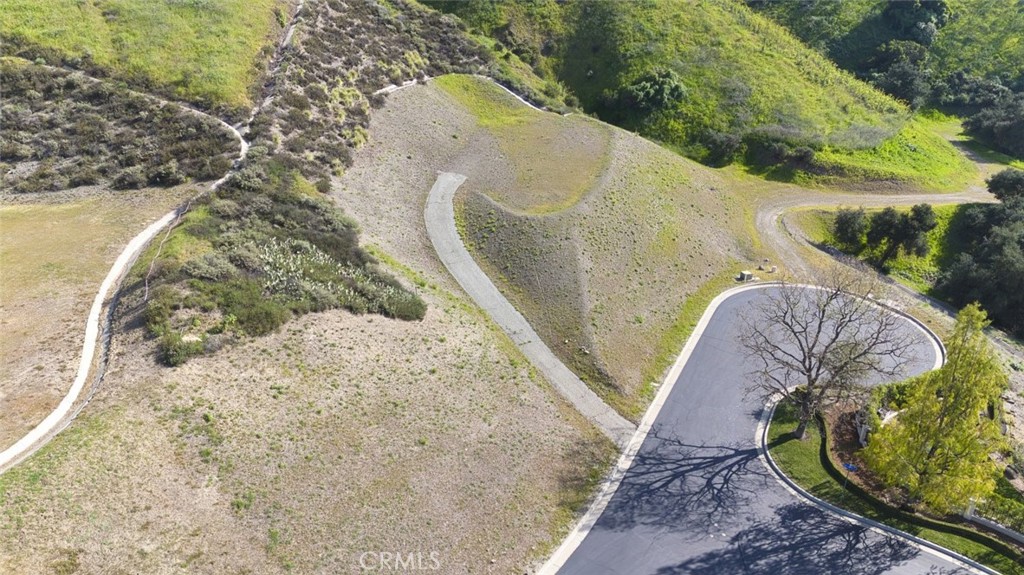 685 Gordon Highlands Road Glendora, CA 91741 - Photo 16 of 35 a view of a swimming pool in a backyard