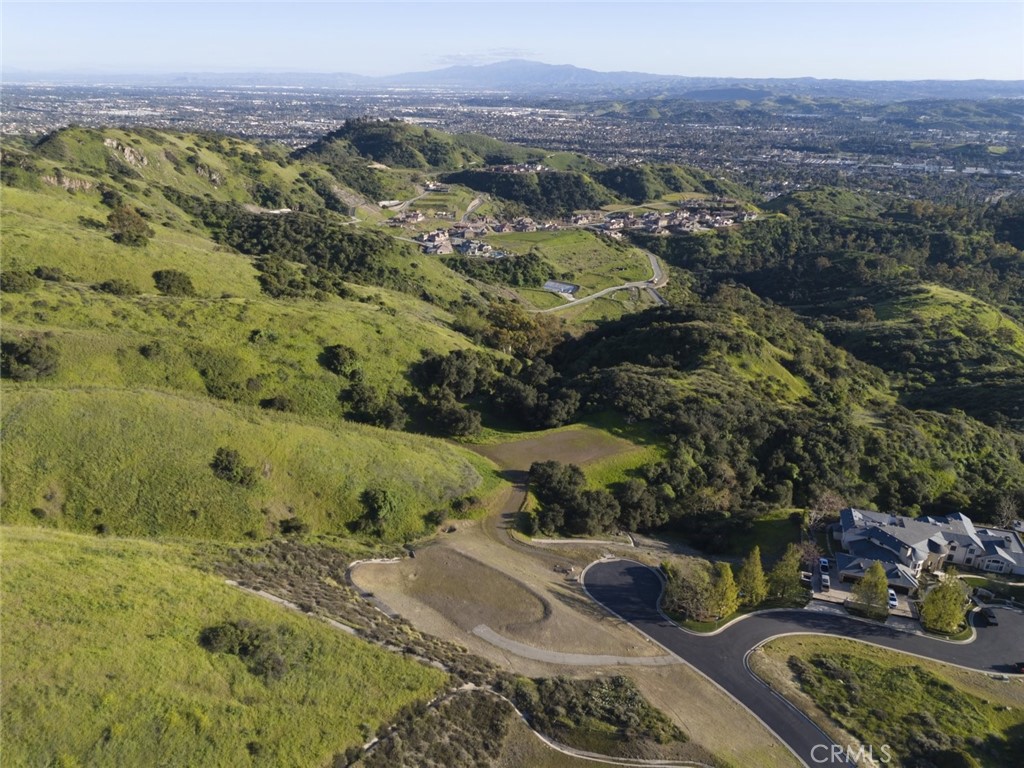 685 Gordon Highlands Road Glendora, CA 91741 - Photo 32 of 35 an aerial view of residential houses with outdoor space