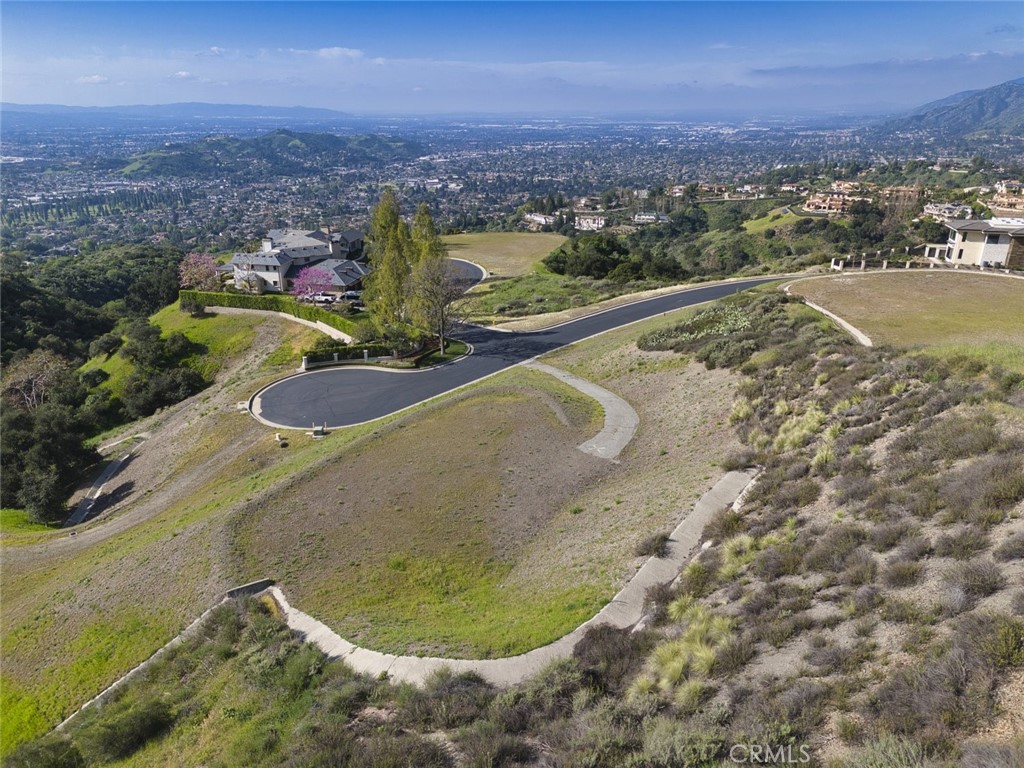 685 Gordon Highlands Road Glendora, CA 91741 - Photo 8 of 35 an aerial view of residential houses with outdoor space and trees
