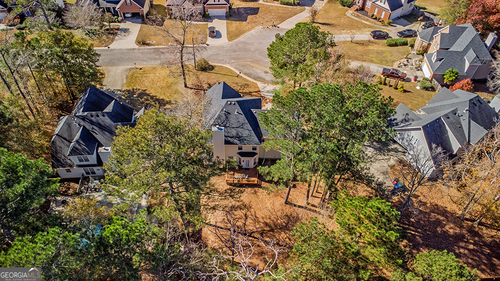 643 Millrun Court Macon, GA 31210 - Photo 8 of 45 an aerial view of a house with a yard and garden