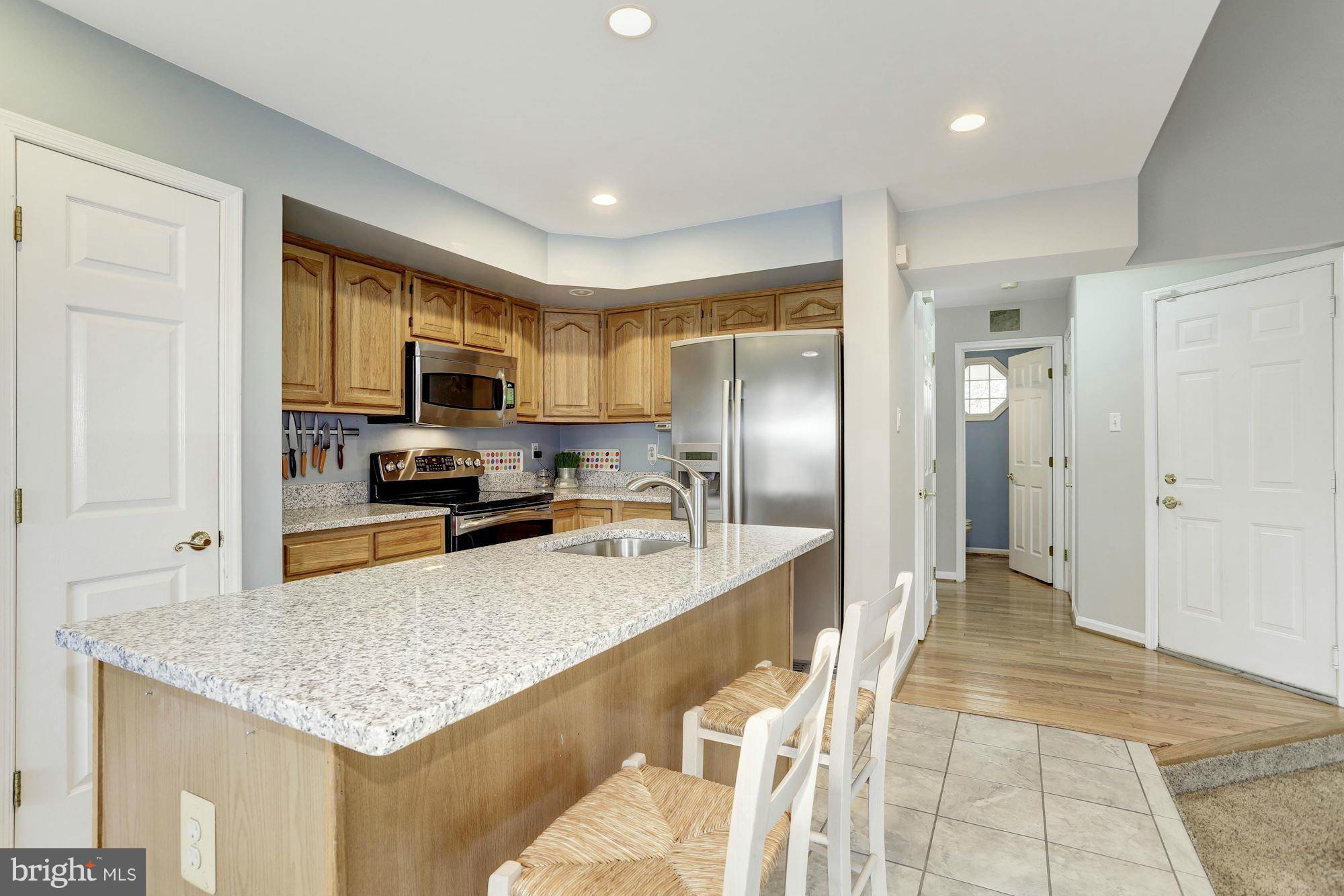 8338 Painted Rock Road Columbia, MD 21045 - Photo 7 of 30 BRAND NEW granite (2/7/2017) & ceramic tile (2/720