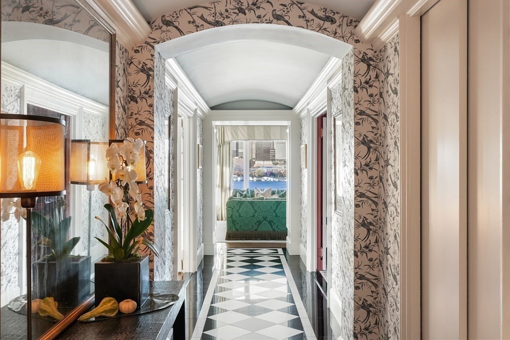 282 Beacon Street, Unit 6 Boston, MA 02116 - Photo 13 of 26 a view of a entryway door with couch