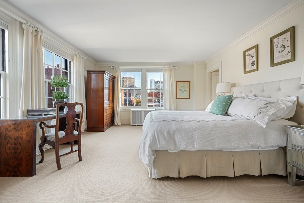 282 Beacon Street, Unit 6 Boston, MA 02116 - Photo 18 of 26 a bed room with furniture and a window